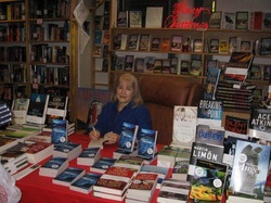 Signing books at Seattle Mystery Bookshop